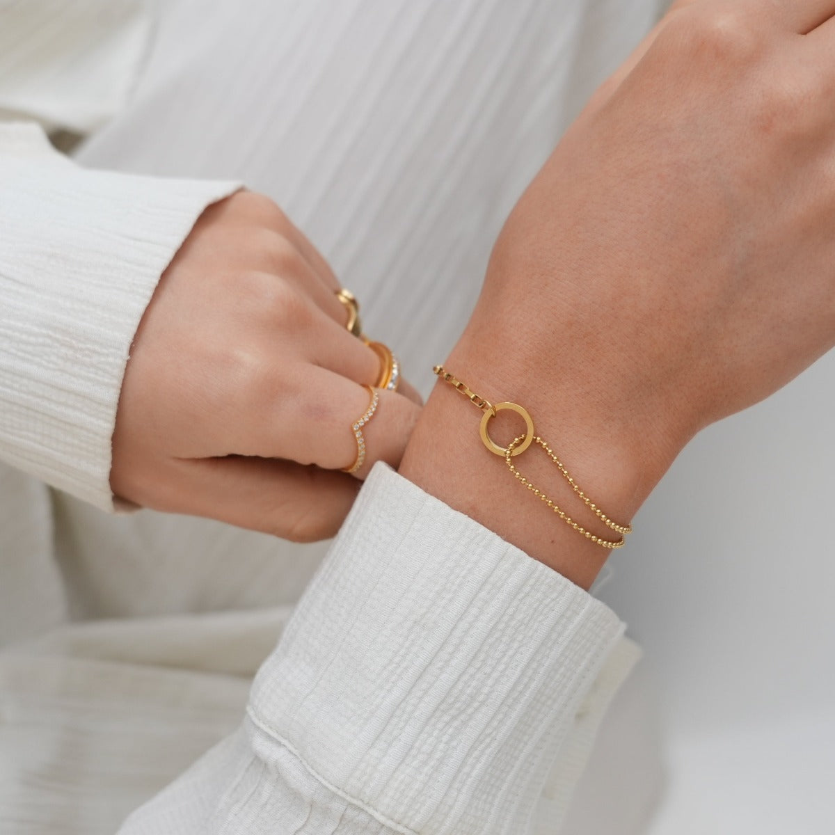 Orin Curve Sculpted Bracelet in gold-tone, side profile view