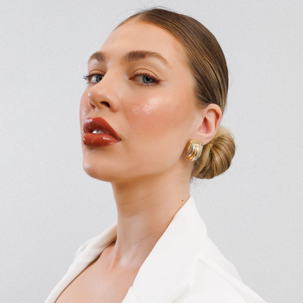 Lumet Crest Light Accent Earrings in mixed gold- and silver-tone, styled product view