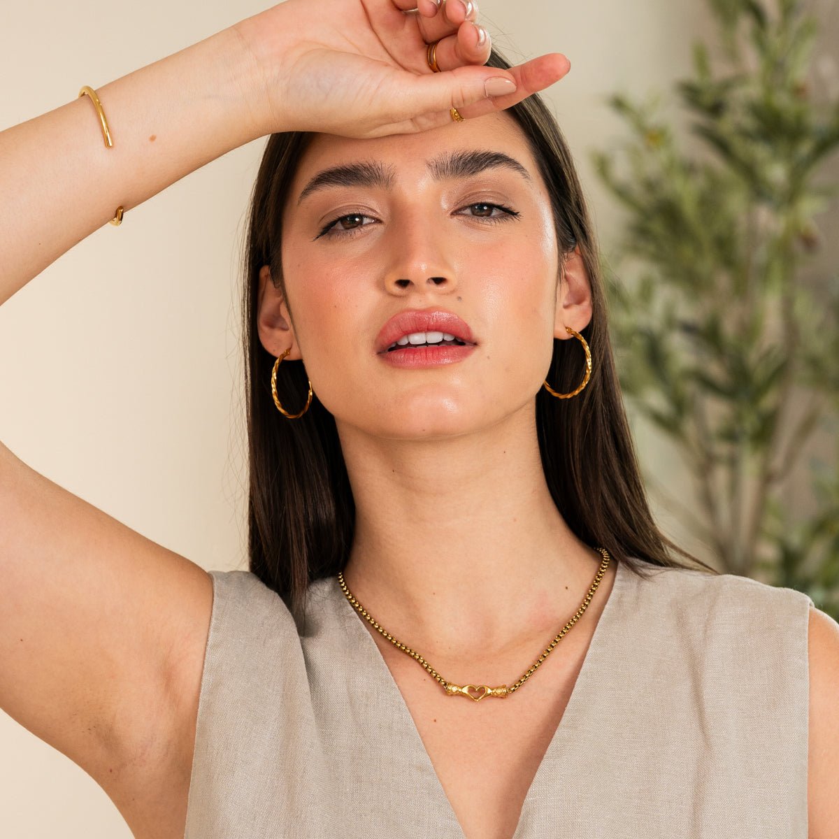 Vela Trace Sculpted Necklace in gold-tone, styled product view