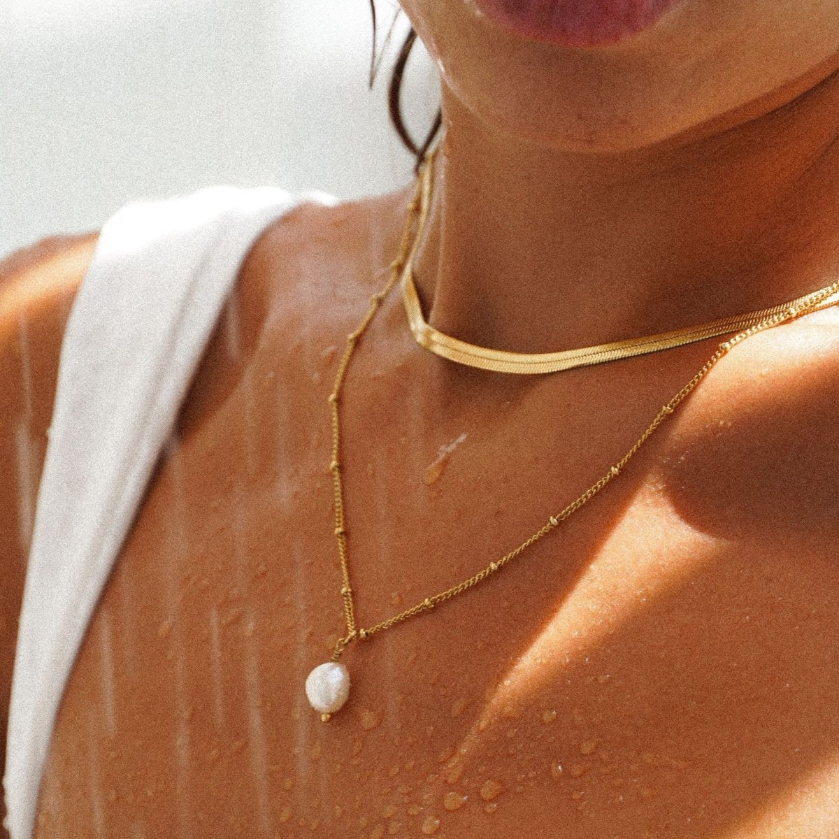 Nacre Fold Light Accent Necklace in gold-tone, alternate product angle