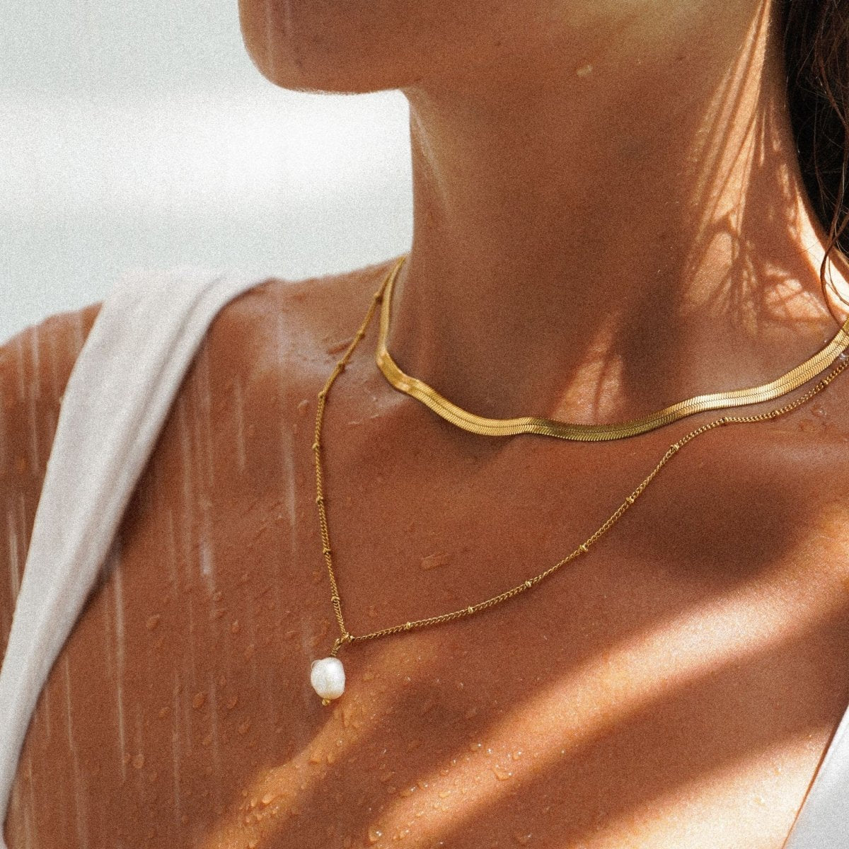 Nacre Fold Light Accent Necklace in gold-tone, styled product view